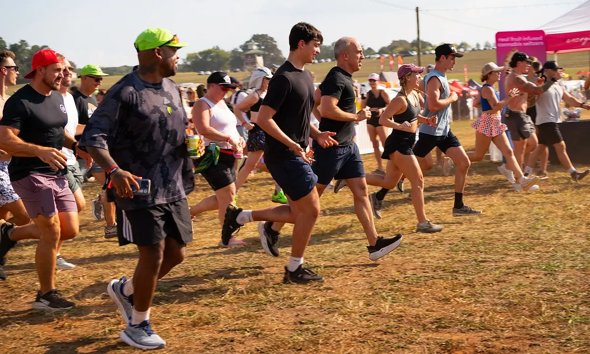 runners sprinting at the start of an outdoor race